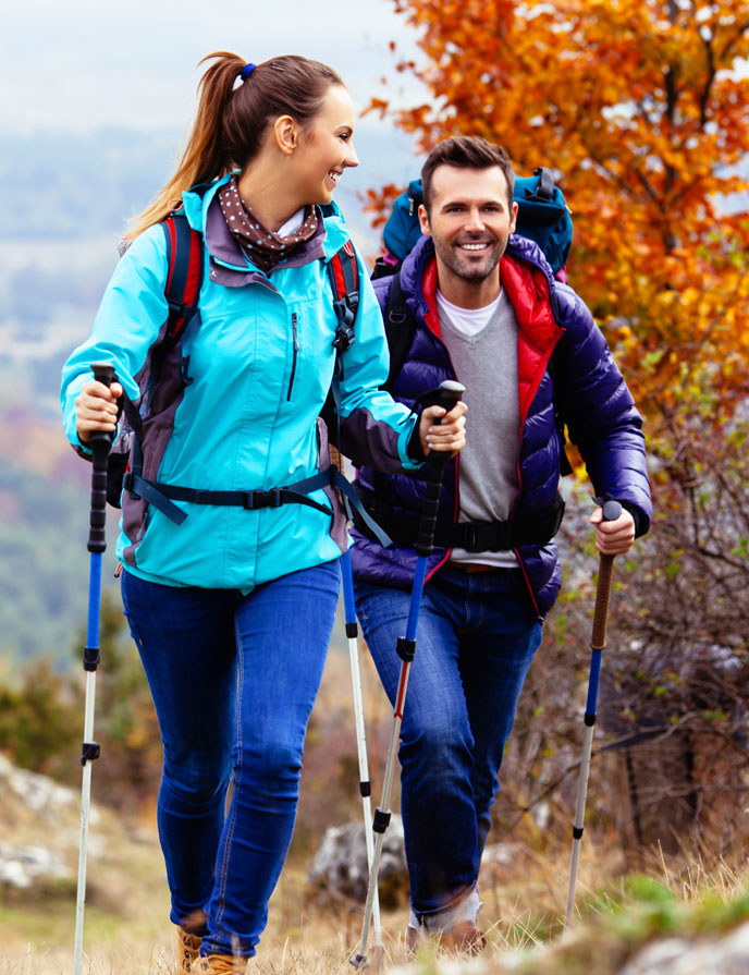 Image of man and woman hiking.