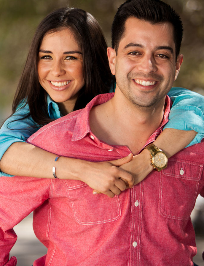image of man and woman smiling