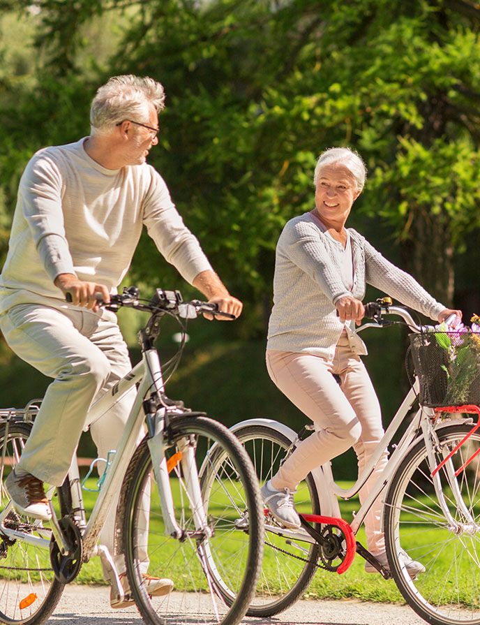 Image of couple riding bikes.