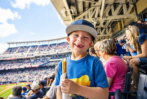 little boy at baseball game