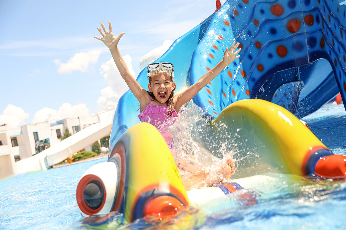 child on waterslide 
